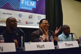 Donald Thoms VP Programming/General Audience, center, is flanked by filmmakers Byron Hurt, left, and Yance Ford, right, during a SXSW panel on indie filmmakers. Donald Thoms, PBS programming v.p., center, reacts to a comment from the audience during a SXSW panel on independent documentaries Tuesday. At left is filmmaker Byron Hurt; right, filmmaker Yance Ford. (Photo: Ben Mook, Current)