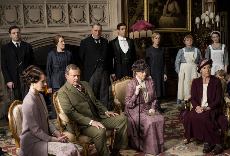 Downton Abbey, Season 5 MASTERPIECE on PBS Sundays, January 4 - March 1, 2015 at 9pm ET Episode 2 Rose hits on a strategy to get a radio in the house. Sarah tutors Daisy. An art historian arrives. Anna makes a difficult purchase. SHOWN: BRENDAN COYLE as John Bates, ELIZABETH McGOVERN as Cora, Countess of Grantham, PHYLLIS LOGAN as Mrs Hughes, HUGH BONNEVILLE as Robert, Earl of Grantham, JIM CARTER as Mr Carson, ROBERT JAMES-COLLIER as Thomas, MAGGIE SMITH as Violet, Dowager Countess of Grantham, JOANNE FROGGATT as Anna, LESLEY NICOL as Mrs Patmore, PENELOPE WILTON as Isobel Crawley and SOPHIE McSHERA as Daisy (C) Nick Briggs/Carnival Film & Television Limited 2014 for MASTERPIECE This image may be used only in the direct promotion of MASTERPIECE CLASSIC. No other rights are granted. All rights are reserved. Editorial use only. USE ON THIRD PARTY SITES SUCH AS FACEBOOK AND TWITTER IS NOT ALLOWED.