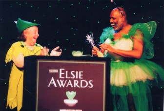 Hillman plays Peter Pan as WQED President George Miles poses as Tinker Bell at the 2002 Elsie Awards. (Photo: Hillman Family Foundations)