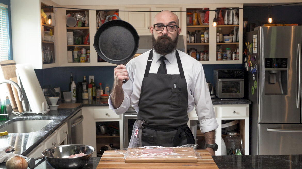 https://current.org/wp-content/uploads/2022/11/Dennis-Perez-holding-a-cast-iron-skillet-whiel-filming-for-Create-TV-Courtesy-of-Dennis-Perez-1170x658.jpg