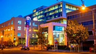 NPR headquarters in Washington, DC at night.