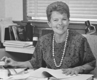 Callahan working at her desk at KERA in 1988. (Photo courtesy AZPM)