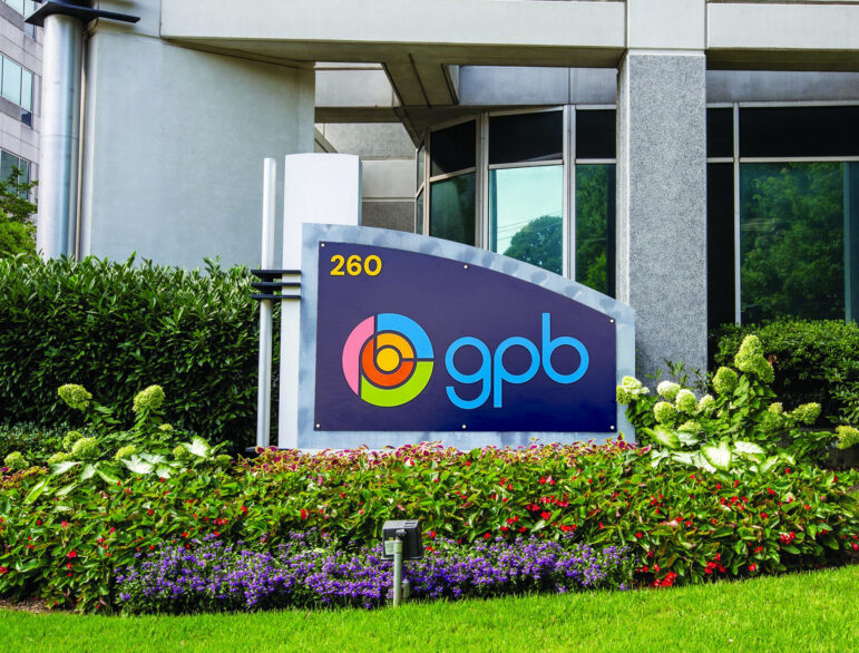 The new Georgia Public Broadcasting logo on a sign.