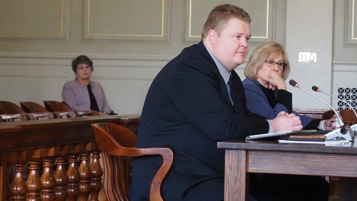 Arkansas PBS CEO Courtney Pledger and CFO Jason Kunau answer questions during an Arkansas Senate committee hearing in February. At left is Maria Sullivan, a member of the Arkansas Educational Television Commission and wife of Sen. Dan Sullivan, who sponsored legislation to abolish the commission.