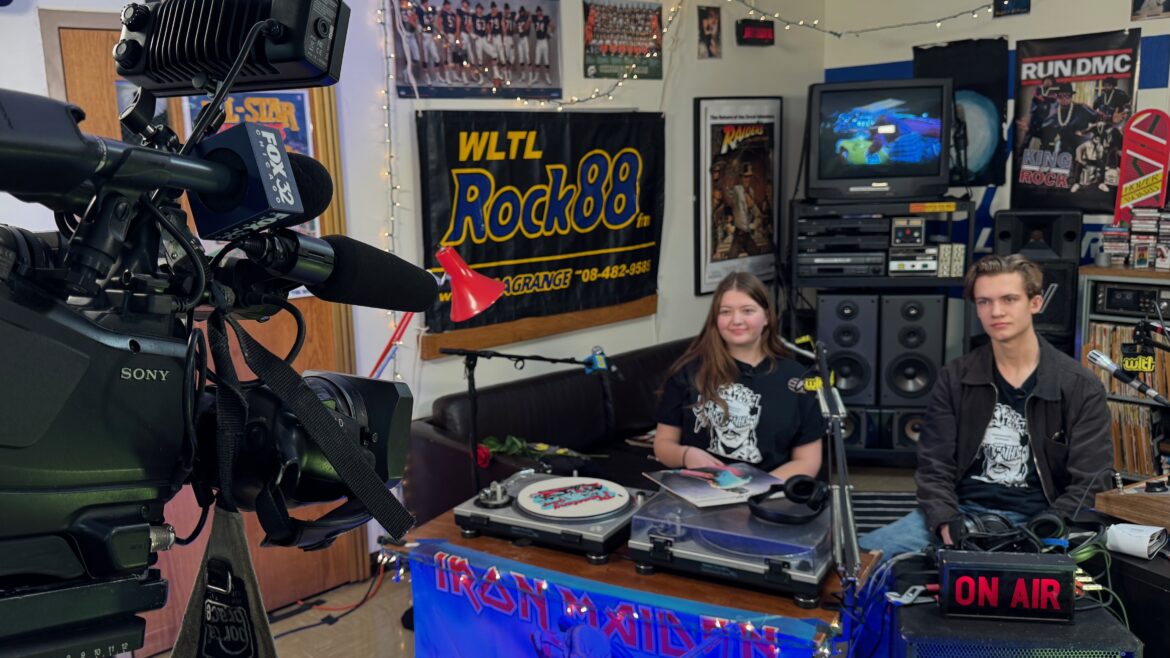 WLTL hosts Katie Beyer and Ethan Meuer wait to go on air with the Fox 32 Chicago noon newscast to promote the station's annual pledge drive.