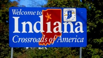 A sign that says "Welcome to Indiana, Crossroads of America"