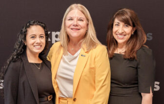 KPBS Gratitude Collective Co-chairs Nishma Held, left, and Valerie Attisha, right, with GM Deanna Mackey.