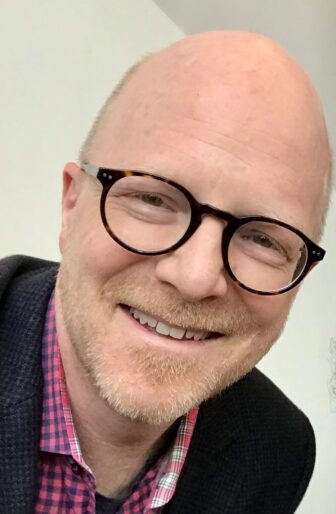 A headshot of Fred Child.