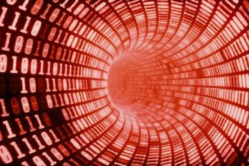 Conceptual image of a red tunnel of digital binary code