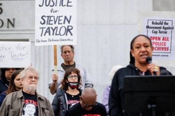 Community organizer and KPFA radio host Cat Power speaks at a rally outside the Rene C. Davidson Courthouse in Oakland, Calif., in September 2025.