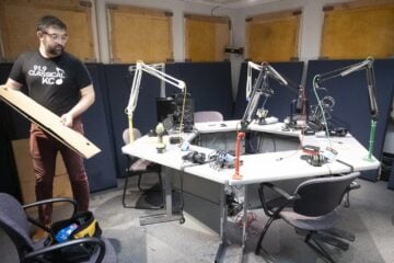 KCUR Production Director Sam Wisman packs up inside a talk show studios.
