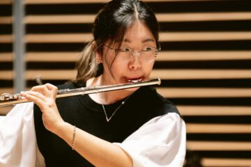 Musician Olivia Park plays the flute for a recent episode of “From the Top.”