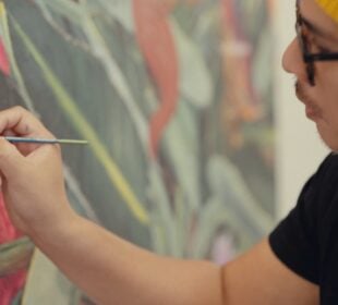 Visual artist Patrick Martinez working in his studio.