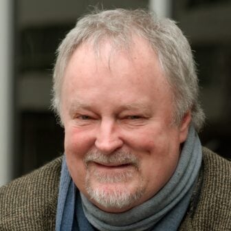 Headshot of Bill McGlaughlin, longtime WFMT classical music host