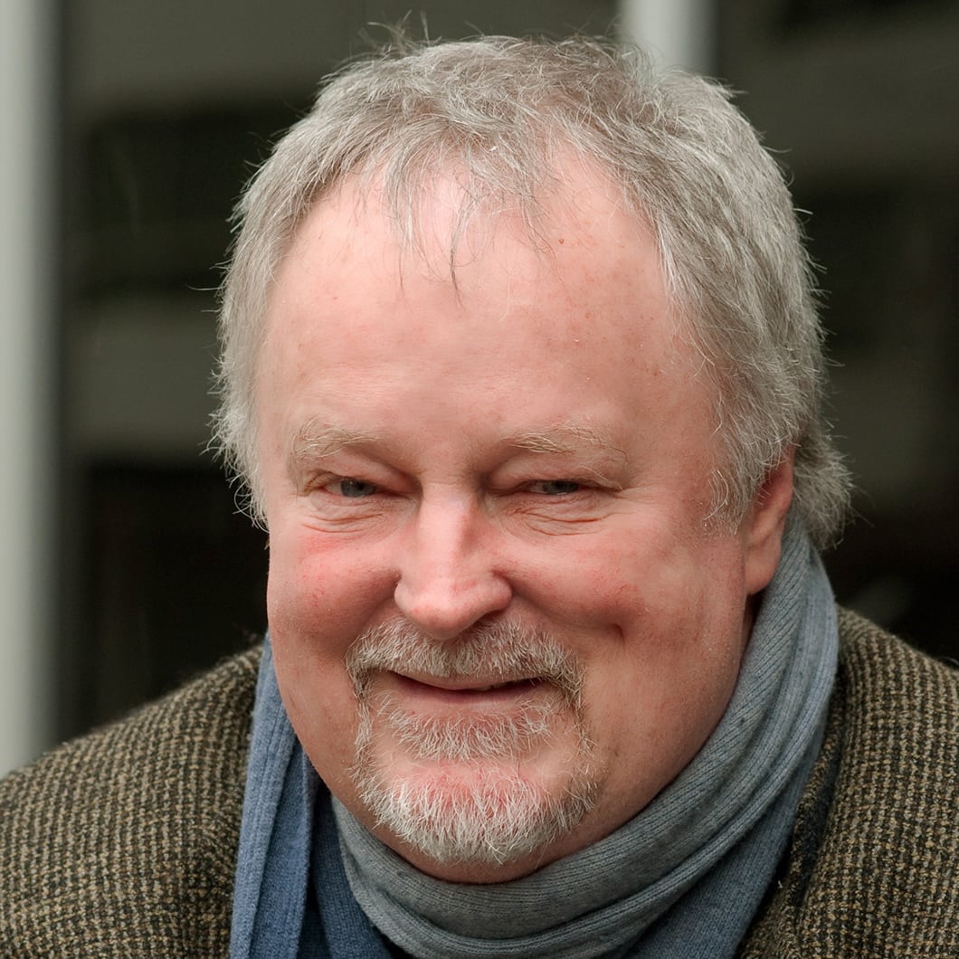 Headshot of Bill McGlaughlin, longtime WFMT classical music host