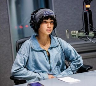 Eumari King Perez, a student whose ”Podcasting Democracy“ submission was featured on-air, sits in a KQED studio in June.