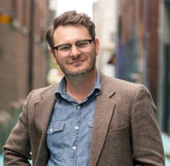 Headshot of Ryan Van Velzer, managing editor of collaboratives at Louisville Public Media.
