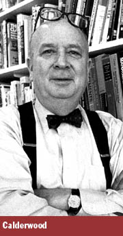 Calderwood, bow-tied, with glasses propped on his bald head