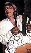 Collinet wields African instrument