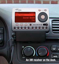 An XM receiver on the dash