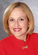 Paula Kerger in a red suit