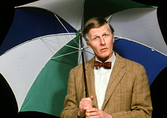 Ives with umbrella in an on-air appearance for WGBH