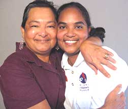 Mother and daughter hug 