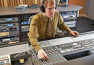 Alan Mclellan at the mixing board for performance studio